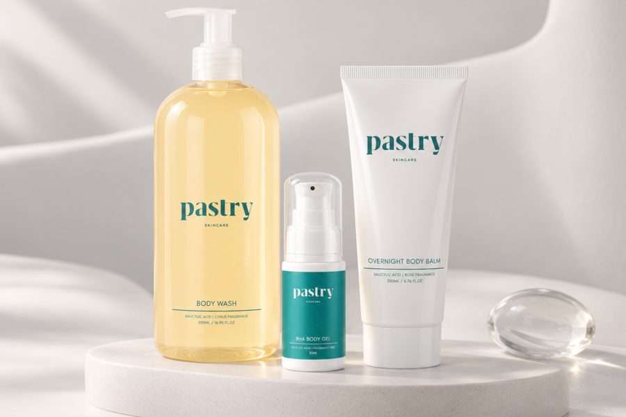 Pastry Acne collection featuring Salicylic Acid Body Wash, BHA Overnight Body Balm, BHA Body Gel Serum on a light warm grey background