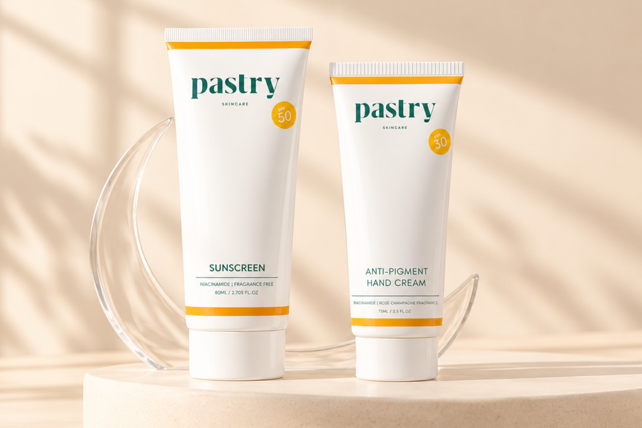 Pastry Sunscreen collection featuring Niacinamide SPF50 Sunscreen, Anti-Pigment Hand Cream SPF30 on a warm ivory background